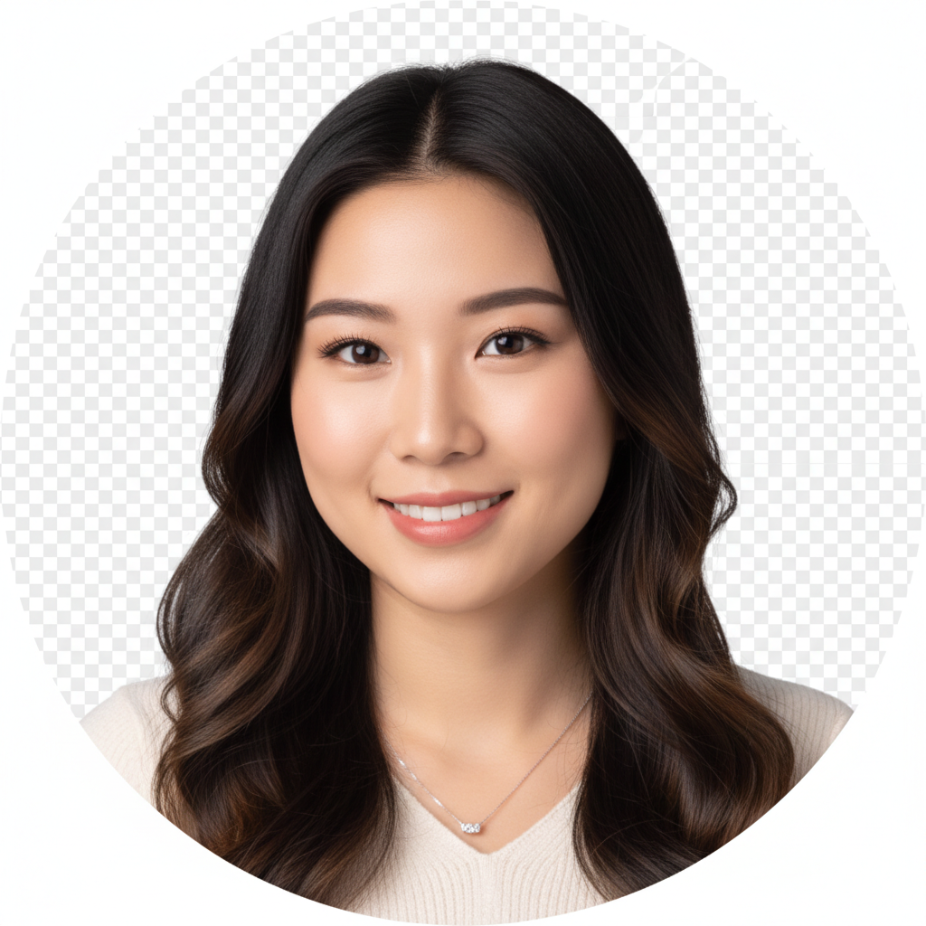 A smiling East Asian woman with long, dark wavy hair and a white top is centered in a circular frame against a checkered background.